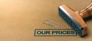 A rubber stamp indicating the cost of sales on our prices.